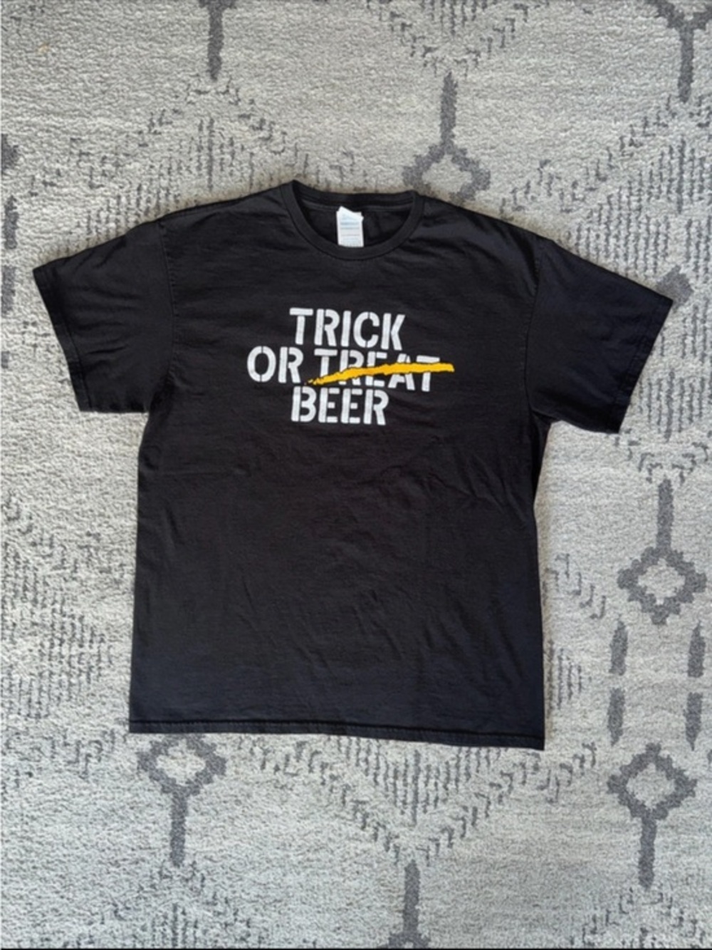Large Delta Black Tee with White Text and Yellow Strike